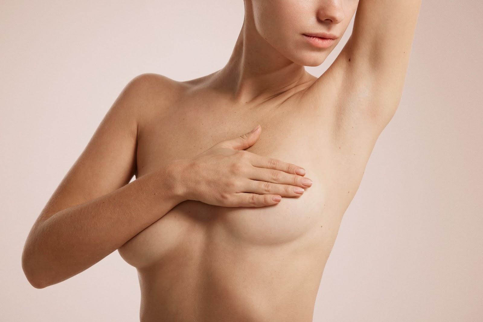 Will health insurance cover my breast reduction?